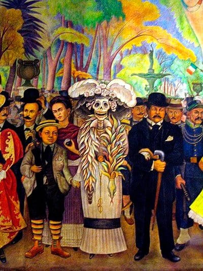 'Sueño de una tarde dominical en la Alameda Central', mural de Diego Rivera o retrata como criança, ao lado da esposa Frida Khalo e de Posada, "pai" de 'La Catrina' - Foto: Wikimedia