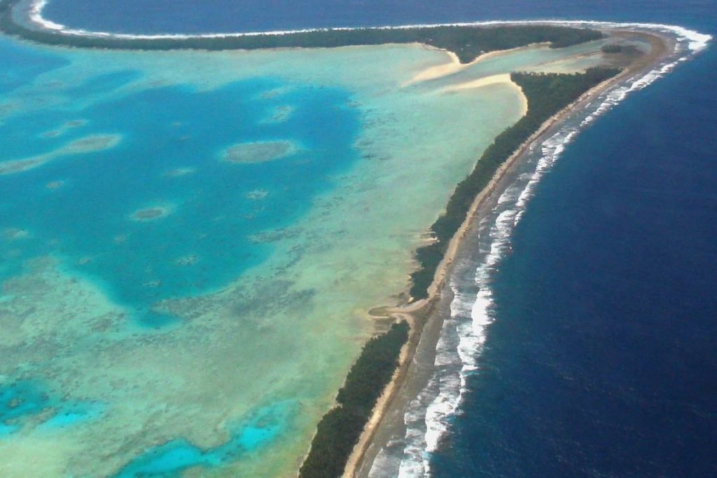 Aerial view of Tuvalu’s capital Funafuti 2011. Tuvalu is a remote country of low lying atolls making it vulnerable to climate change. Photo Lily Anne Homasi DFAT 12779656093