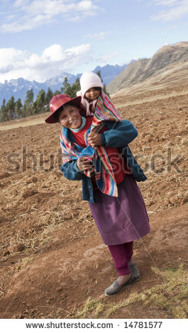 stock-photo--peru-august-a-native-peruvian-women-and-baby-demonstrates-how-to-wrap-and-carry-a-child-on-14781577.jpg