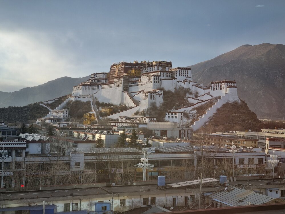 The beautiful Potala Palace at sunset, seen from the restaurant where our tour had dinner.jpg